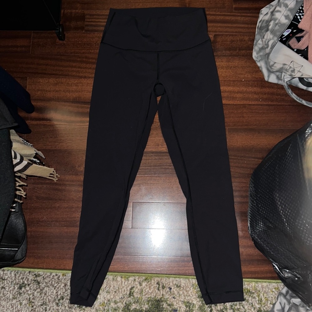 Lululemon athletic pants. Size 6 in black I believe.